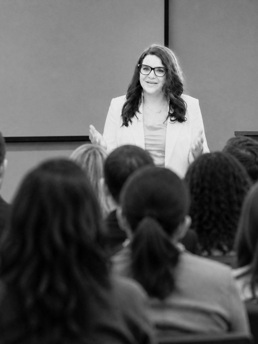 Dr. Adrienne speaking to a professional audience